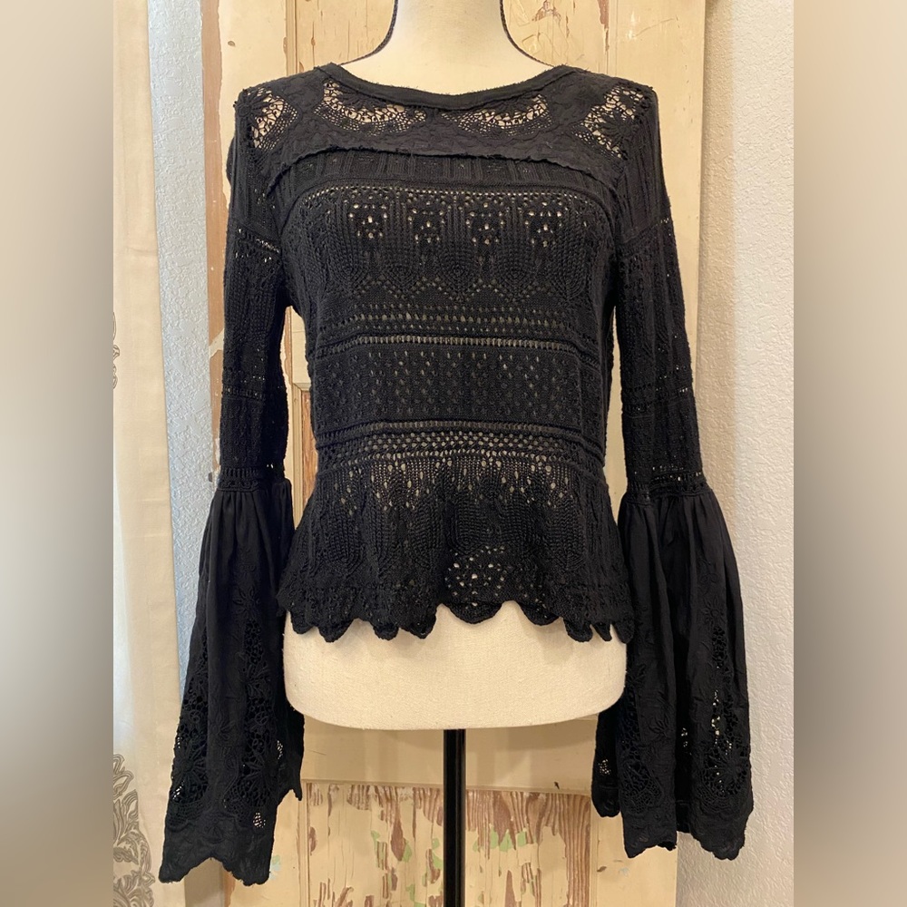Free People Crocheted Top with Bell Sleeves. Color black. Size XS.